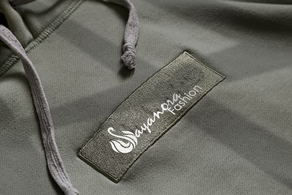 Sayanora Fashions logo on a shirt